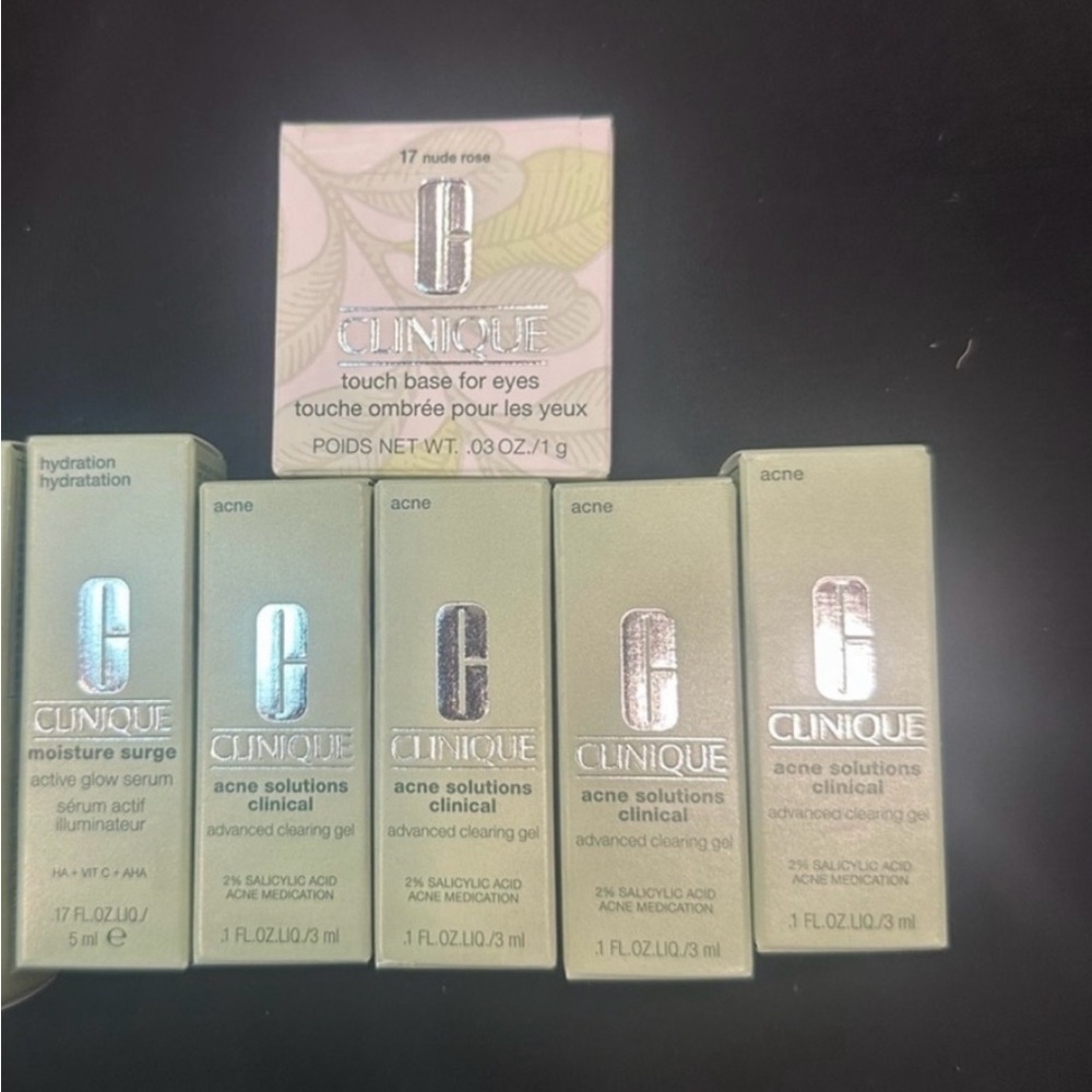 Clinique Acne Solutions and Touch Base Set and mini moisturize surge(7 pieces)